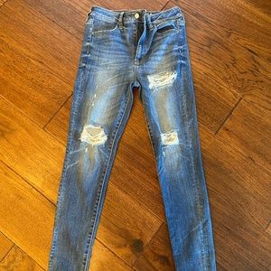 Dark Blue Distressed Skinny Jeans from American Eagle